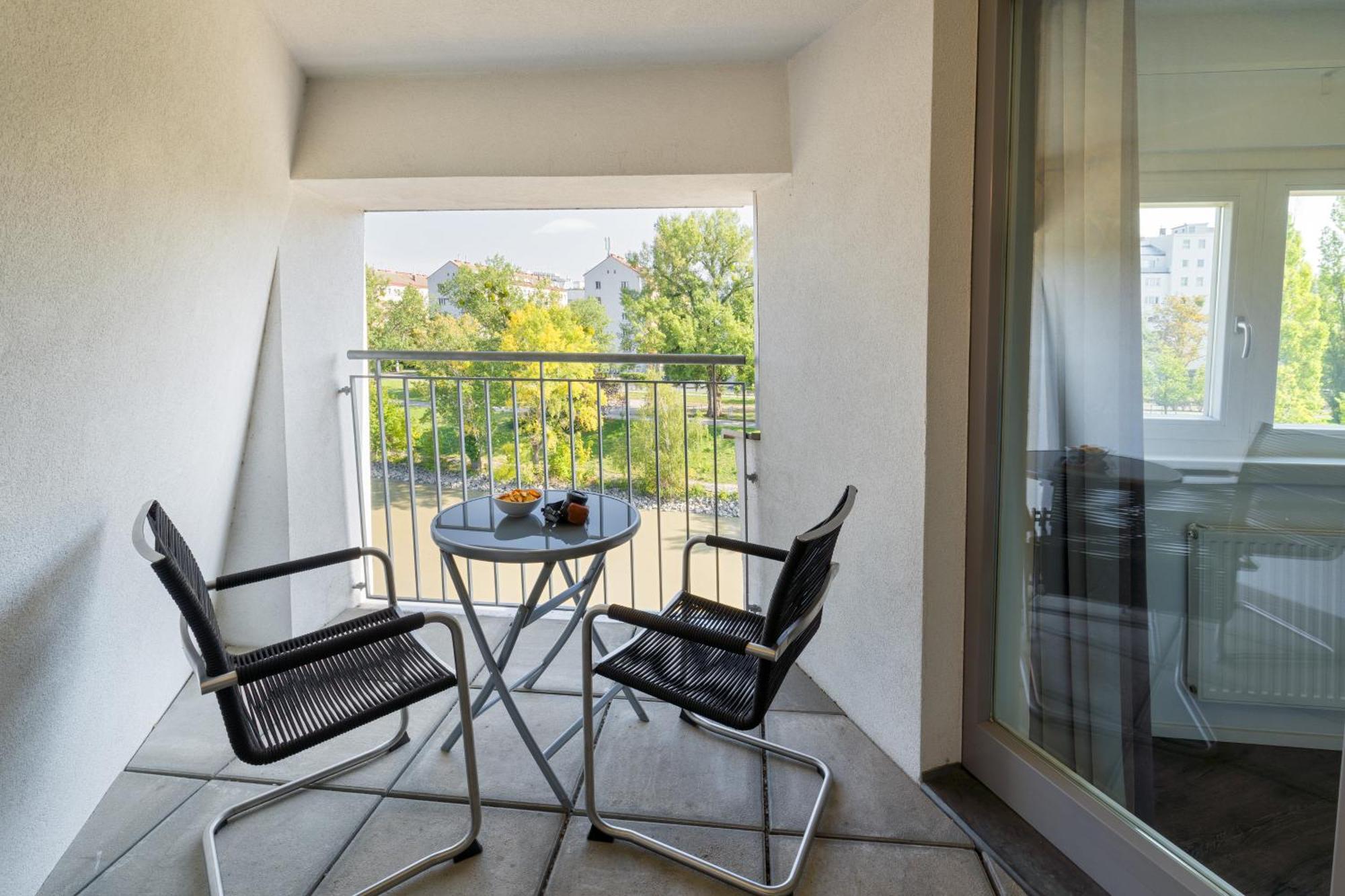 Two-Bedroom Apartment Balcony Riverview,1773458263:JPEG